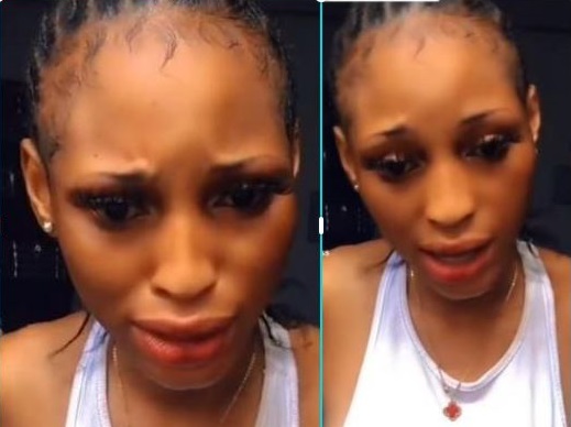 Lady In Viral Video Of Bestial Dog Sleeping Scandal Says She Was Only ‘catching cruise’,
